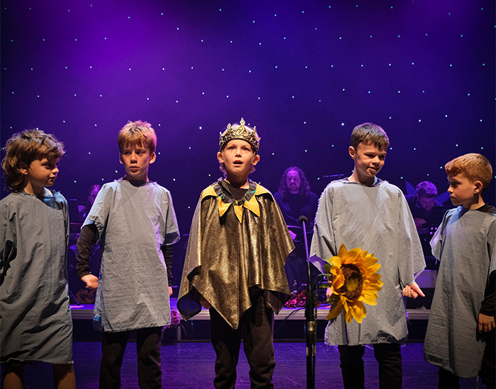 Boys performing one of the secens in Y Coedwig Hud by Mared Llywelyn