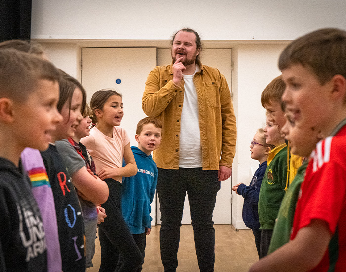 Children looking at each other in a line
